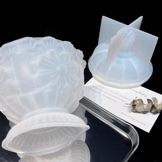 Resin mold, container with floral relief