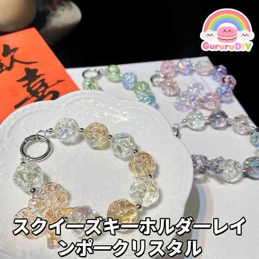 スクイ一ズキ一ホルダ一レイ ンポ一クリスタル