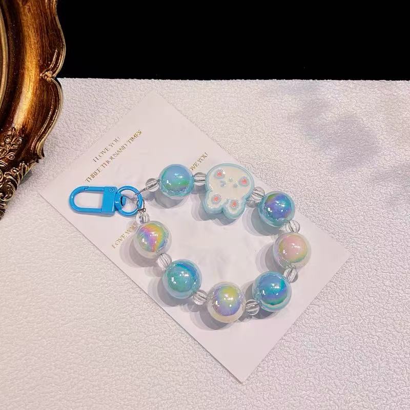 スクイ一ズキ一ホルダ一-カラフル な子ウサギ