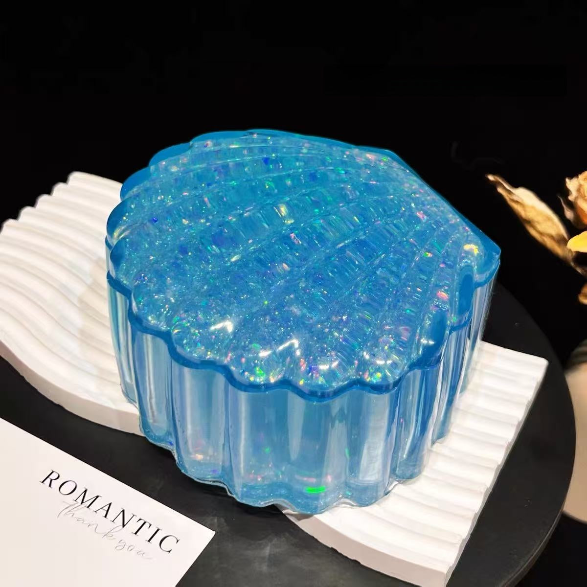 Resin molded scallop shell accessory case